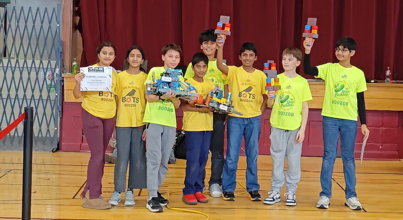 The Bunting Bots and All-Star Pickles holding their VEX IQ awards